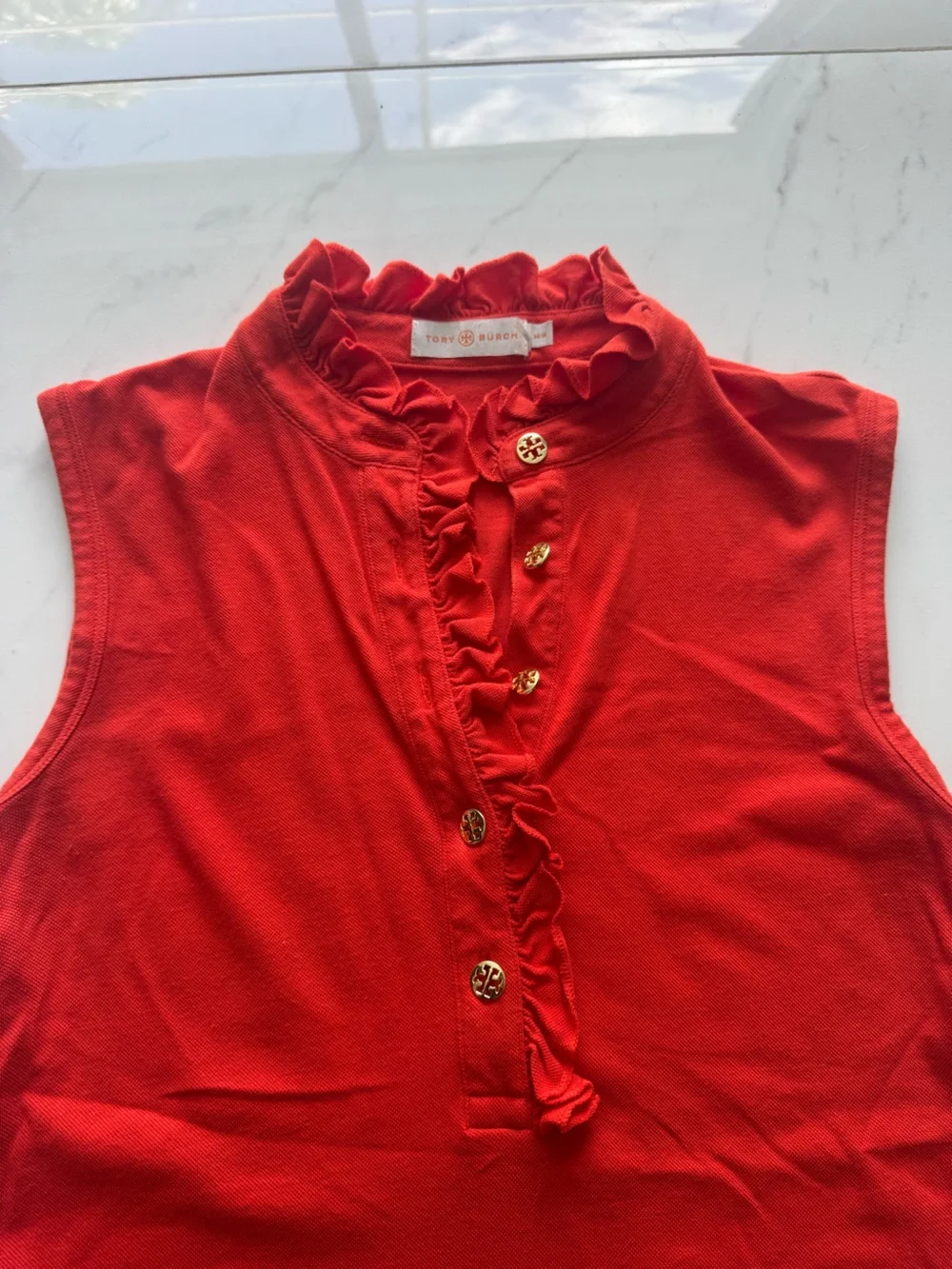 Tory Burch Sleeveless Ruffle Polo with Gold Buttons
